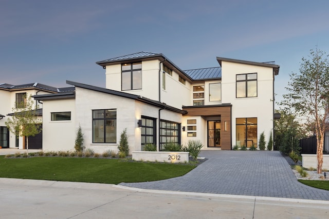 2012 Whitwood Cv, Westlake, TX 76262 - contemporary house featuring a standing seam roof, stucco siding, metal roof, decorative driveway, and a front yard