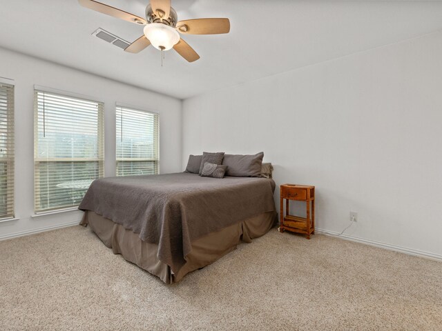 6504 Lago Vista Dr, Benbrook, TX 76132 - bedroom with ceiling fan, carpet flooring, baseboards, and visible vents