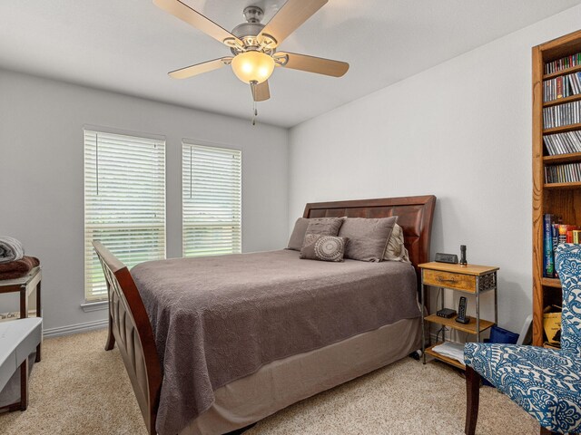 6504 Lago Vista Dr, Benbrook, TX 76132 - bedroom featuring baseboards, a ceiling fan, and carpet flooring