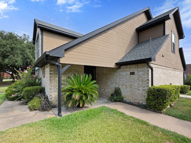 6504 Lago Vista Dr, Benbrook, TX 76132 - view of front of property with brick siding, a front lawn, and roof with shingles