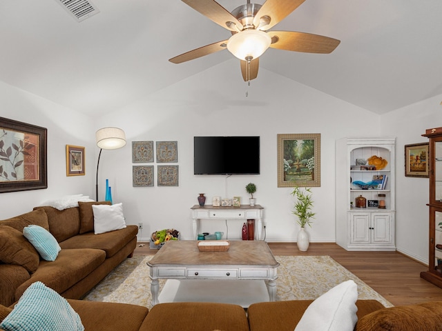 6504 Lago Vista Dr, Benbrook, TX 76132 - living area featuring visible vents, baseboards, a ceiling fan, vaulted ceiling, and wood finished floors
