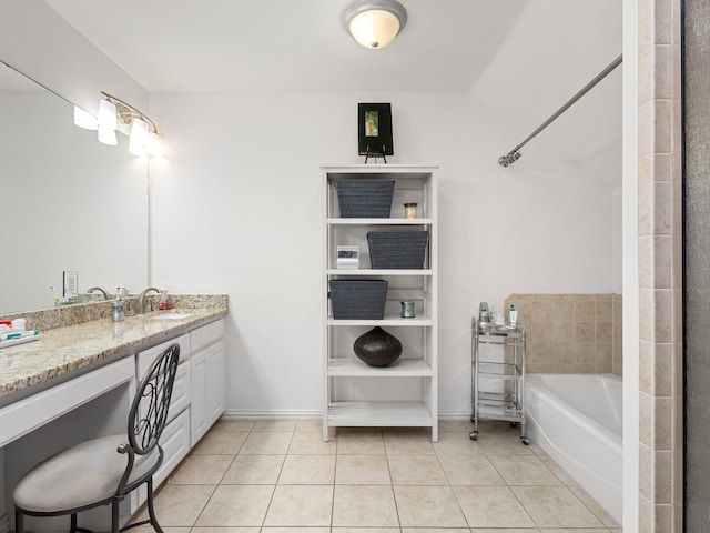 6504 Lago Vista Dr, Benbrook, TX 76132 - full bathroom with a bathing tub, tile patterned floors, vanity, and baseboards
