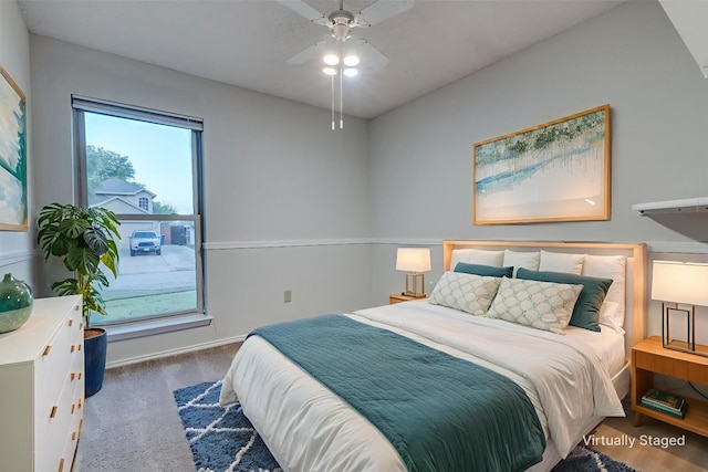 6605 Bluebonnet Dr, Rowlett, TX 75089 - bedroom with baseboards, carpet floors, and a ceiling fan