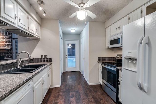 6605 Bluebonnet Dr, Rowlett, TX 75089 - kitchen featuring white appliances, a sink, backsplash, white cabinetry, and dark wood-type flooring