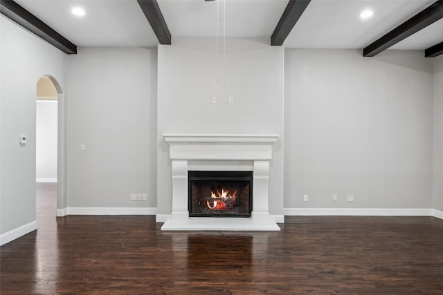 7217 Deer Field Dr, Mansfield, TX 76063 - unfurnished living room with a warm lit fireplace, wood finished floors, beam ceiling, and recessed lighting