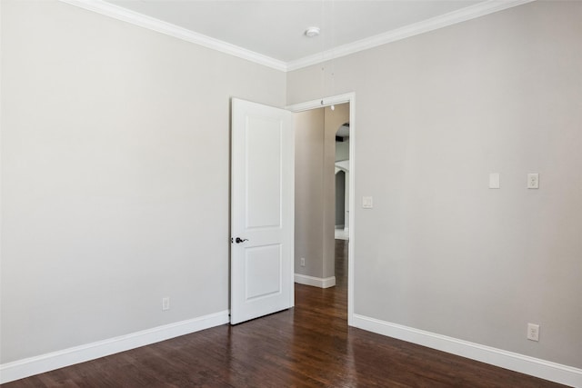 7217 Deer Field Dr, Mansfield, TX 76063 - spare room with baseboards, arched walkways, ornamental molding, and dark wood finished floors
