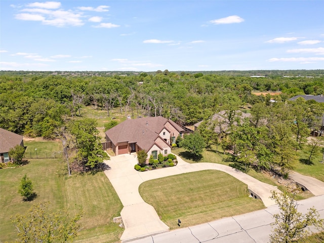 7217 Deer Field Dr, Mansfield, TX 76063 - birds eye view of property with a wooded view