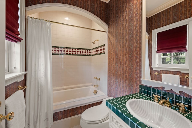 full bath featuring shower / bath combo, toilet, and vanity