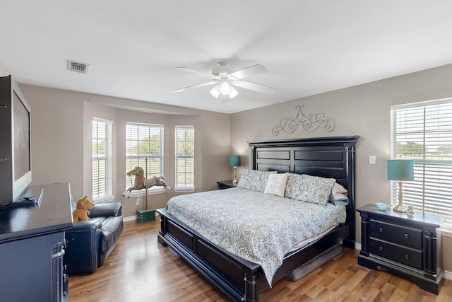 5609 Cedar Creek Dr, Kemp, TX 75143 - bedroom with light wood-type flooring, baseboards, and a ceiling fan