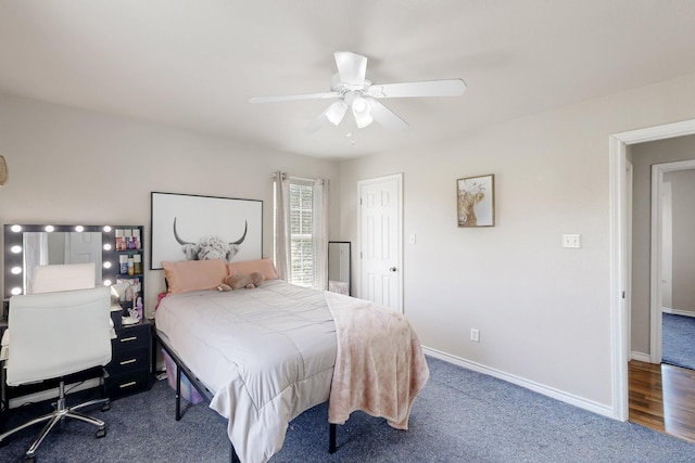 5609 Cedar Creek Dr, Kemp, TX 75143 - bedroom with baseboards, a ceiling fan, and carpet