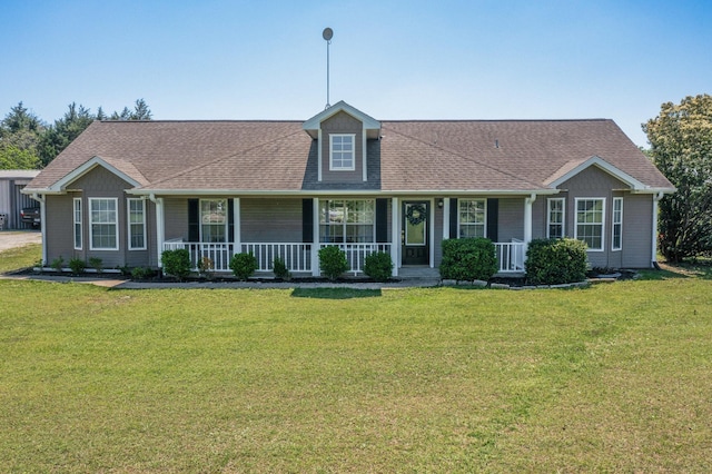 5609 Cedar Creek Dr, Kemp, TX 75143 - view of front of home with covered porch, a front lawn, and roof with shingles