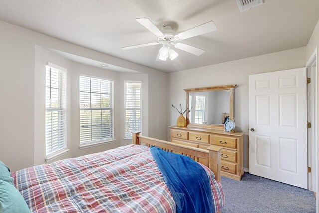 5609 Cedar Creek Dr, Kemp, TX 75143 - bedroom with light colored carpet and a ceiling fan