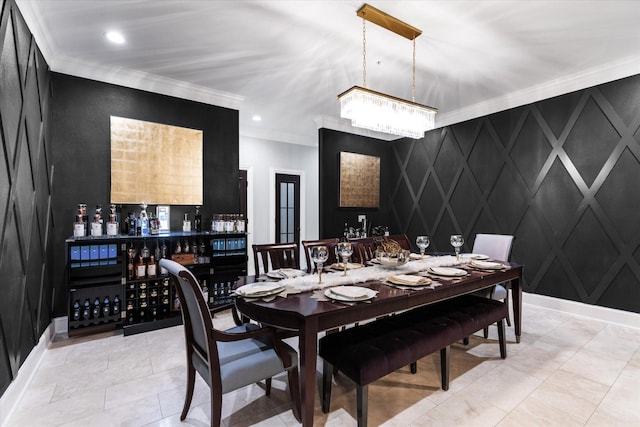 6615 Bandera Ave Unit 1A, Dallas, TX 75225 - dining space featuring crown molding, a chandelier, baseboards, a decorative wall, and a dry bar
