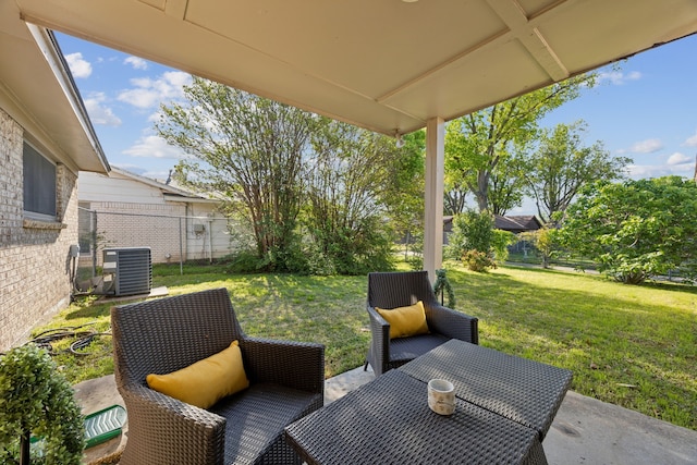 view of patio / terrace with fence and central AC unit