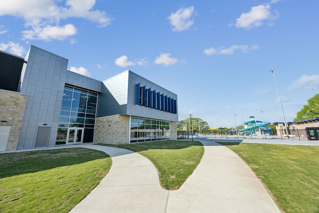view of community featuring a lawn