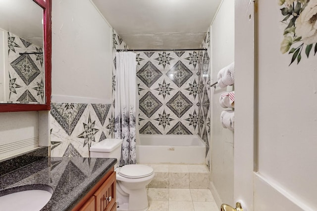 bathroom featuring shower / bath combination with curtain, tile patterned floors, vanity, and toilet