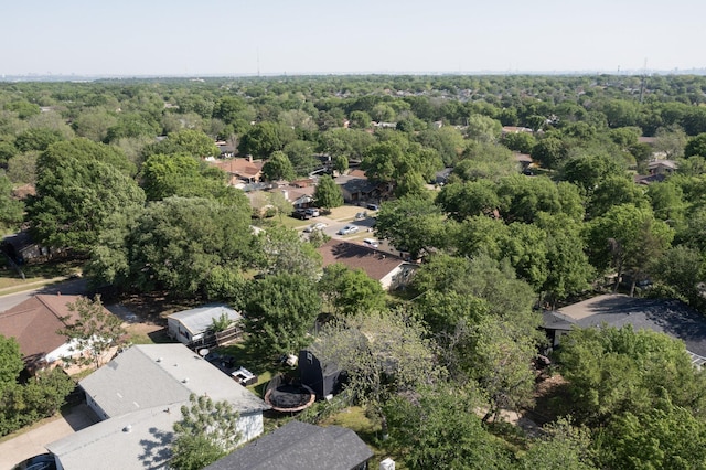 birds eye view of property featuring a residential view and a forest view