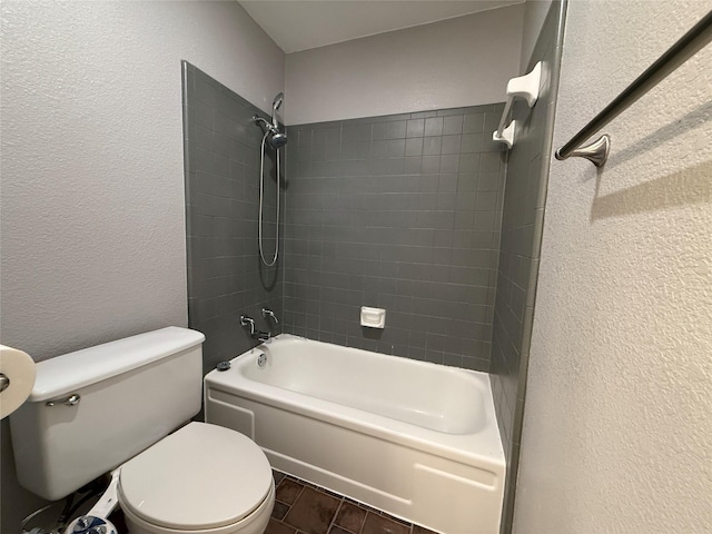 100 Russell St, Lorena, TX 76655 - full bathroom with a textured wall, toilet, and  shower combination