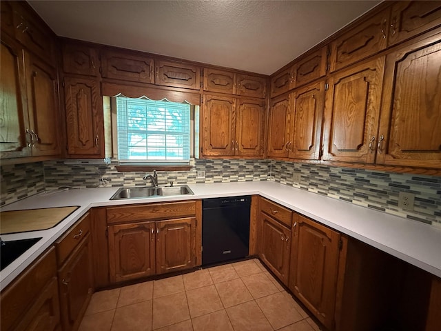 100 Russell St, Lorena, TX 76655 - kitchen featuring black dishwasher, a sink, backsplash, and light tile patterned flooring