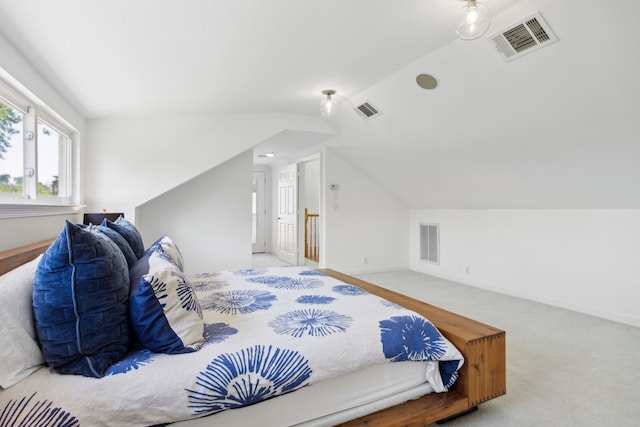 9431 Waterview Rd, Dallas, TX 75218 - carpeted bedroom with visible vents, baseboards, and vaulted ceiling