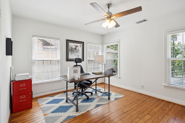 9431 Waterview Rd, Dallas, TX 75218 - office featuring ceiling fan, baseboards, visible vents, and hardwood / wood-style flooring
