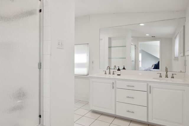 9431 Waterview Rd, Dallas, TX 75218 - bathroom with a shower stall, tile patterned flooring, double vanity, and a sink