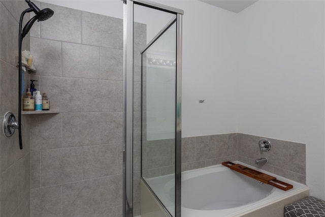 4512 Hiddenite Rd, Little Elm, TX 76227 - bathroom featuring a garden tub and tiled shower