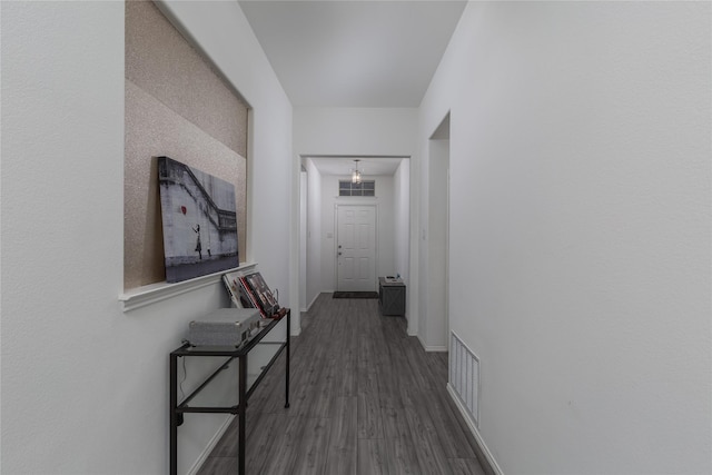 4512 Hiddenite Rd, Little Elm, TX 76227 - corridor with baseboards and dark wood-style flooring