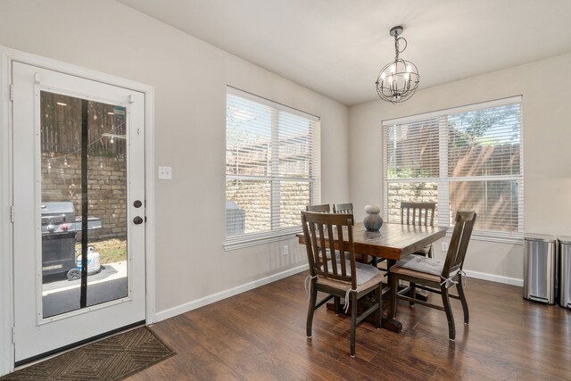 3733 Glassenberry St, Fort Worth, TX 76244 - dining area with dark wood-style flooring, baseboards, and a notable chandelier