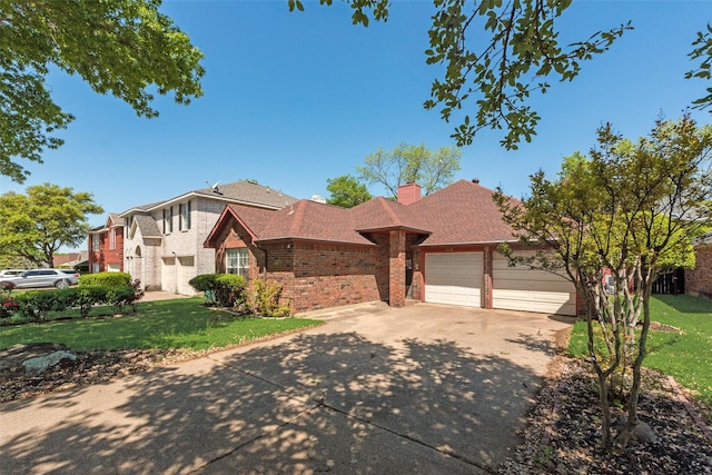 1128 Germany Dr, Cedar Hill, TX 75104 - view of front of house featuring a garage, a front yard, brick siding, and driveway