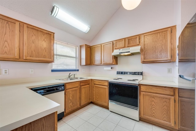 1128 Germany Dr, Cedar Hill, TX 75104 - kitchen with white appliances, vaulted ceiling, under cabinet range hood, light countertops, and a sink