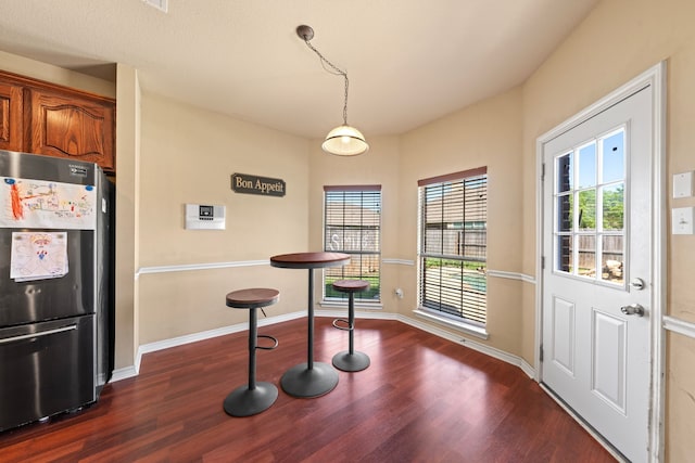 5038 W Fall Dr, Midlothian, TX 76065 - dining space featuring dark wood-style flooring and baseboards