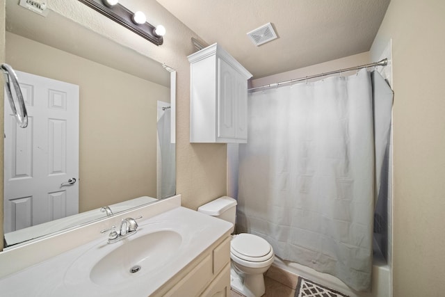 5038 W Fall Dr, Midlothian, TX 76065 - bathroom featuring visible vents, toilet, a textured ceiling, vanity, and tile patterned flooring