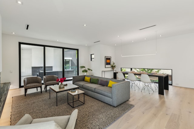 5101 Vickery Blvd, Dallas, TX 75206 - living area featuring light wood-type flooring and recessed lighting