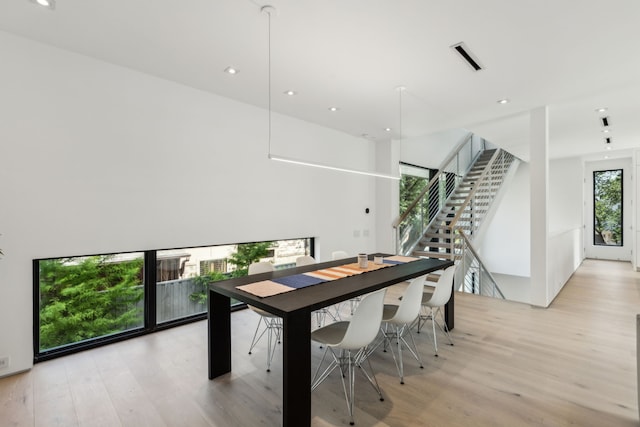 5101 Vickery Blvd, Dallas, TX 75206 - dining space with light wood-type flooring, stairs, and recessed lighting