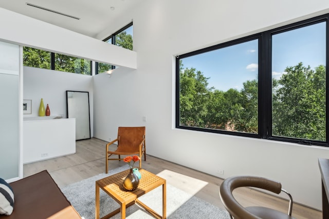5101 Vickery Blvd, Dallas, TX 75206 - living area featuring light wood-style flooring and a high ceiling