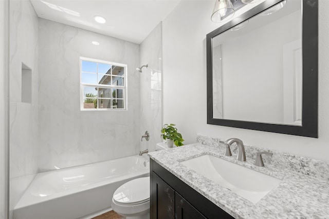 full bath featuring toilet, vanity, and shower / bathing tub combination