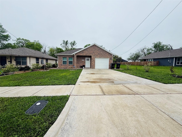 single story home with a garage, fence, concrete driveway, brick siding, and a front lawn