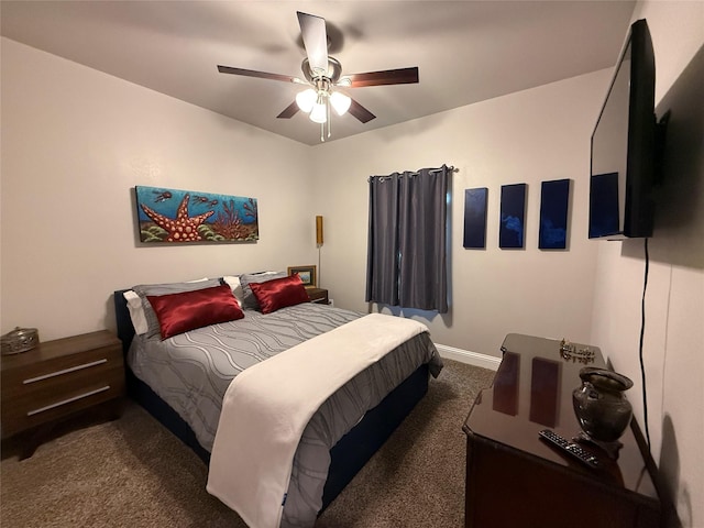 bedroom with carpet flooring, baseboards, and a ceiling fan