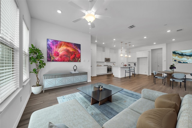 2949 Tenor Way, Sachse, TX 75048 - living area featuring visible vents, a ceiling fan, recessed lighting, and dark wood-style floors