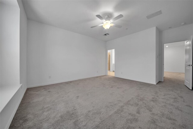 2949 Tenor Way, Sachse, TX 75048 - unfurnished room with carpet, visible vents, baseboards, and a ceiling fan