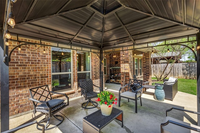 714 Lone Star Ct, Wylie, TX 75098 - view of patio featuring fence, a gazebo, and an outdoor living space