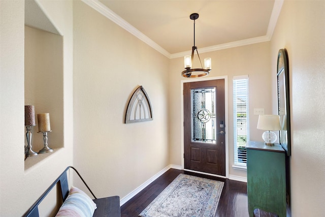 714 Lone Star Ct, Wylie, TX 75098 - entryway with crown molding, dark wood-style flooring, a chandelier, and baseboards