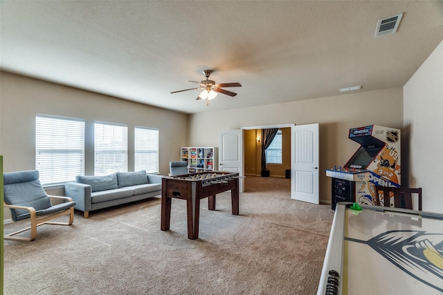 912 Lorene Dr, Wylie, TX 75098 - game room featuring carpet, a ceiling fan, and healthy amount of natural light