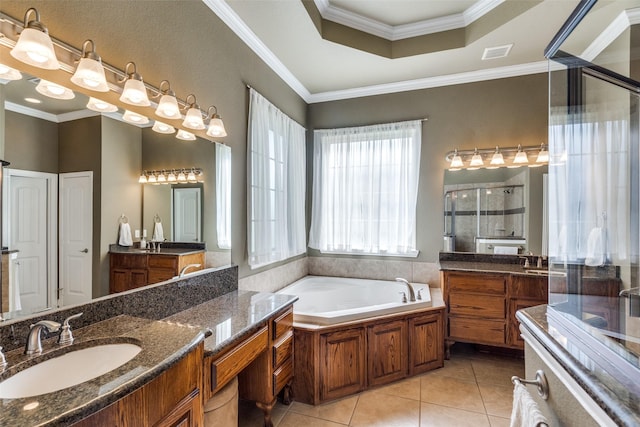 912 Lorene Dr, Wylie, TX 75098 - bathroom with a stall shower, two vanities, a bath, tile patterned floors, and crown molding