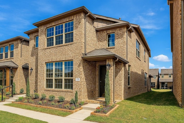 930 Estelle Dr, Euless, TX 76040 - view of front of home featuring a front yard and brick siding