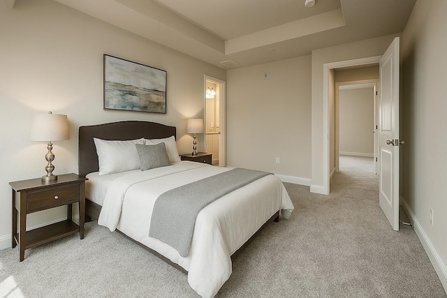 930 Estelle Dr, Euless, TX 76040 - bedroom featuring light colored carpet, baseboards, and a raised ceiling