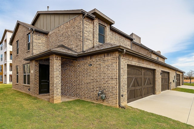 930 Estelle Dr, Euless, TX 76040 - exterior space with a front yard, a garage, board and batten siding, brick siding, and driveway