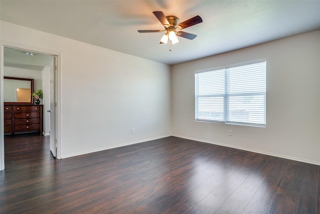 2027 Pine Knot Dr, Heartland, TX 75126 - spare room with dark wood-style flooring, ceiling fan, and baseboards