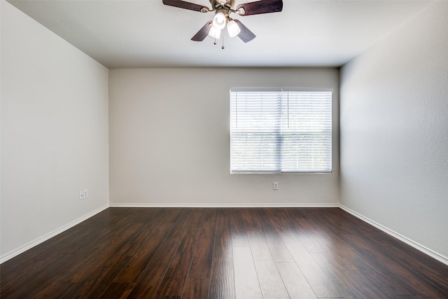 2027 Pine Knot Dr, Heartland, TX 75126 - spare room featuring a ceiling fan, dark wood-style flooring, and baseboards
